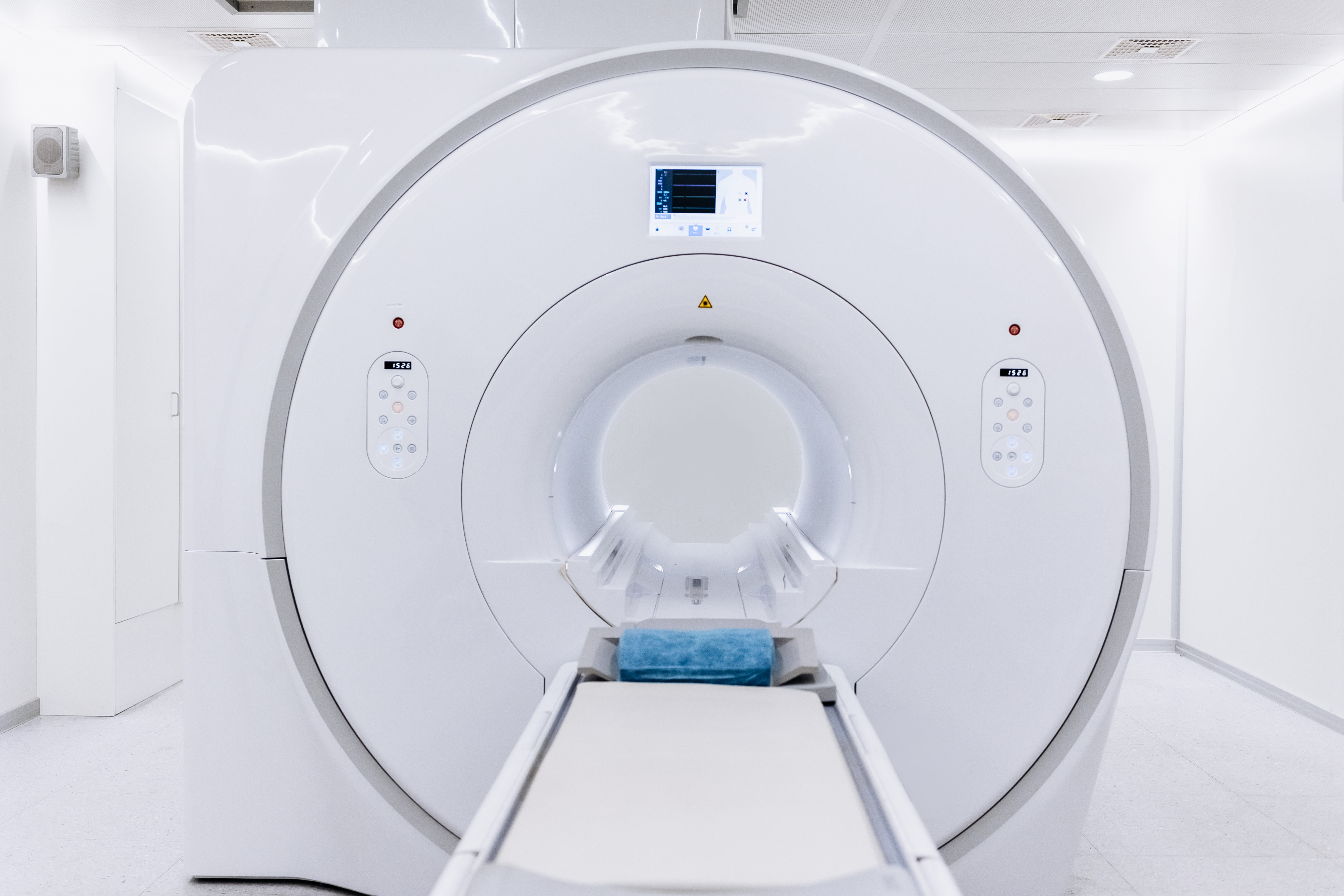 MRI scanner used as a visual metaphor for diagnosis.